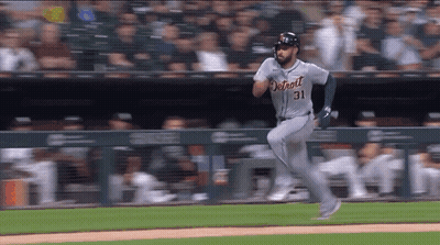Baseball Player Number 31 Running on Field