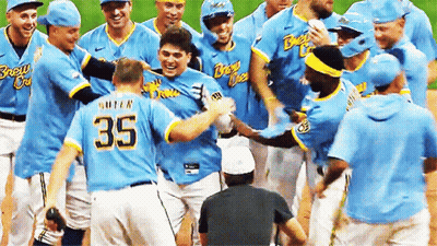 Baseball Player Number 35 Surrounded By Players GIF