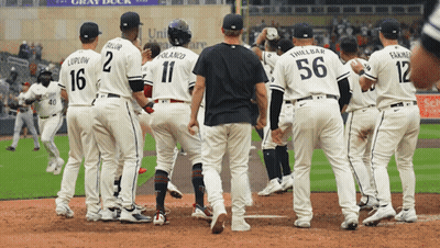 Baseball Player Number 56 With Teammates GIF
