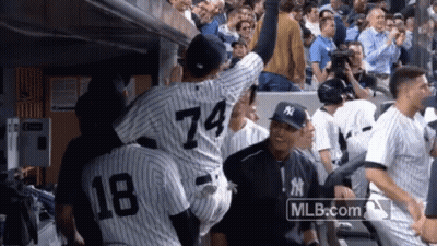 Baseball Player Number 74 Being Lifted GIF