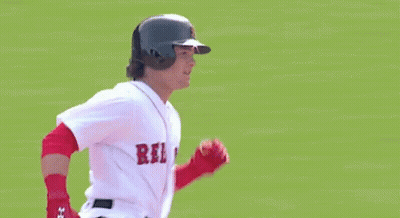 Baseball Player Pointing Up In Helmet And Gloves GIF
