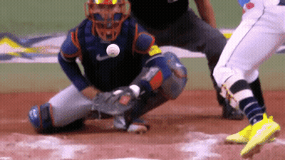 Baseball Player Ready To Catch Ball With Catcher Kneeling GIF