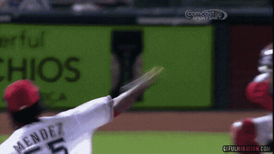 Baseball Player Ready To Hit Ball With Catcher And Umpire GIF
