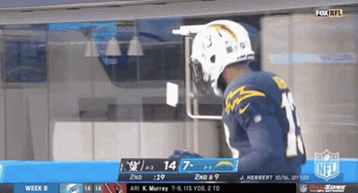 Baseball Player Running To Catch Ball In Front Of Chevrolet Sign GIF