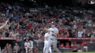 Baseball Player Running To Dugout With Crowd GIF