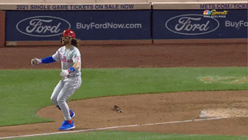 Baseball Player Running Towards Home Plate GIF