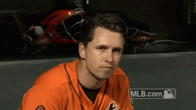Baseball Player Sitting In Dugout GIF