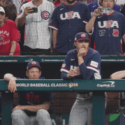 Baseball Player Sitting In Dugout GIF