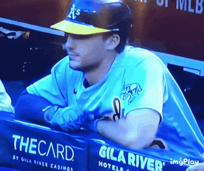 Baseball Player Sitting In Dugout With The Card Sign GIF