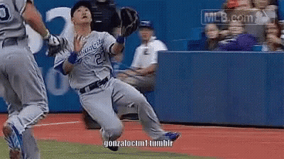 Baseball Player Sliding Into Base In Kansas City Uniform GIF