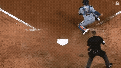Baseball Player Sliding Into Base With Referee Watching GIF