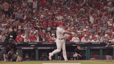 Baseball Player Sliding Into Base With Referee Watching GIF