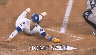 Baseball Player Sliding Into Home Plate Saying Home Safe GIF