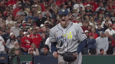Baseball Player Standing on Field