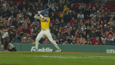 Baseball Player Swinging At Ball In Front Of Smartwater Ad GIF