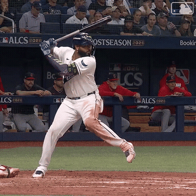 Baseball Player Swinging At Ball With Postseason Banner GIF