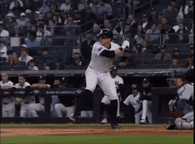 Baseball Player Swinging At Ball GIF