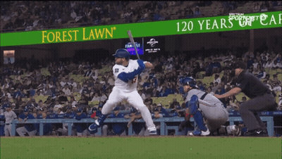 Baseball Player Swinging At Pitch GIF