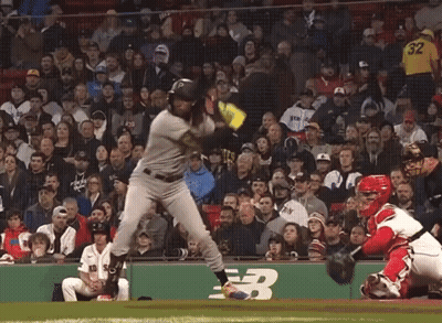 Baseball Player Swinging At Pitch As Crowd Watches GIF