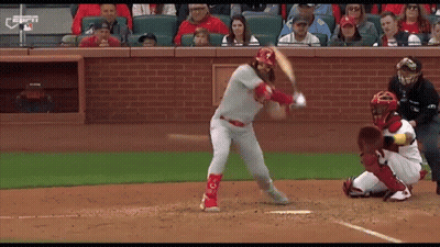 Baseball Player Swinging At Pitch Catcher Watching GIF