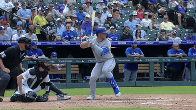 Baseball Player Swinging At Pitch In Front Of Nixon Banner GIF