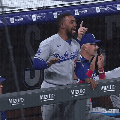 Baseball Player Swinging At Pitch GIF
