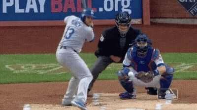 Baseball Player Swinging At Pitch GIF