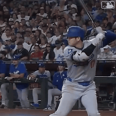 Baseball Player Swinging Bat At Ball GIF