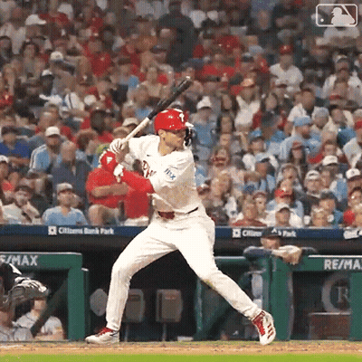 Baseball Player Swinging Bat At Game GIF