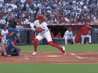Baseball Player Swinging Bat At Pitch GIF