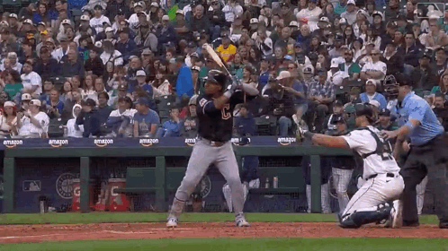 Baseball Player Swinging Bat Catcher Watches GIF