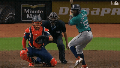 Baseball Player Swinging Bat In Front Of Duke Energy Banner GIF