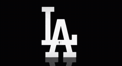 Baseball Player Swinging Bat In Front Of LA GIF