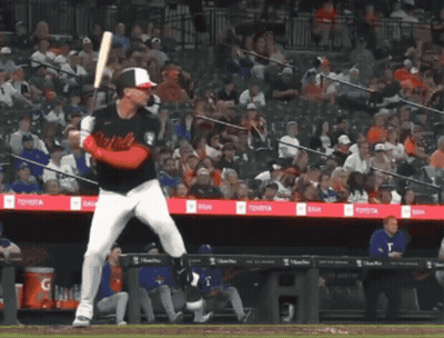 Baseball Player Swinging Bat In Front Of True Banner GIF