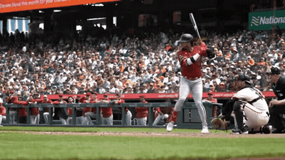 Baseball Player Swinging Bat Near National Bank Sign GIF