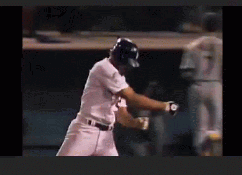 Baseball Player Swinging Bat Number 10 GIF