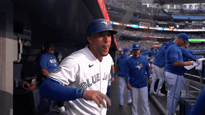 Baseball Player Swinging In Front Of KPMG Banner GIF