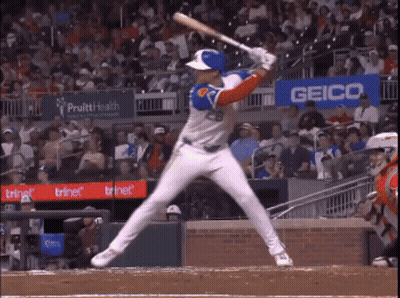 Baseball Player Swinging Near Geico Sign GIF