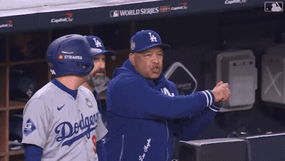 Baseball Player Talking To Coach In Dodgers Jersey GIF