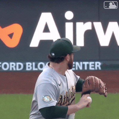 Baseball Player Throwing Ball In Front Of Airw Sign GIF