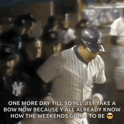 Baseball Player Throwing Ball in Front of Crowd
