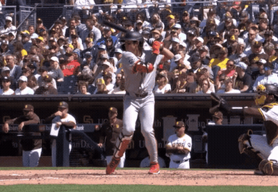 Baseball Player Throwing Ball In Front Of Sub Above Sign GIF