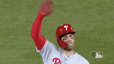 Baseball Player Waving Hand In Red Helmet GIF
