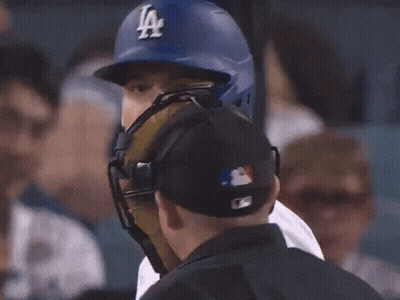 Baseball Player Wearing Helmet Talking To Umpire GIF