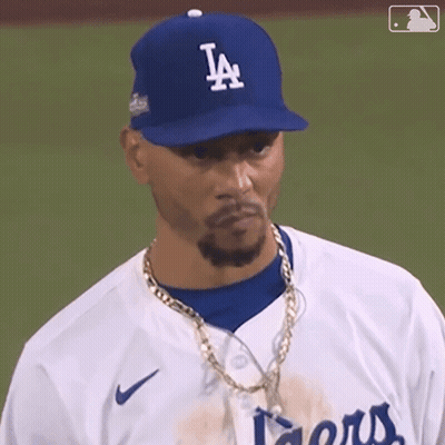 Baseball Player Wearing LA Hat And Chain GIF