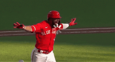 Baseball Player Wearing Number 19 Hugs Teammate GIF