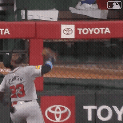 Baseball Player Wearing Number 23 Throwing Ball GIF