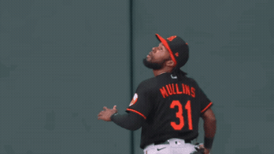 Baseball Player Wearing Number 31 Catches Ball GIF