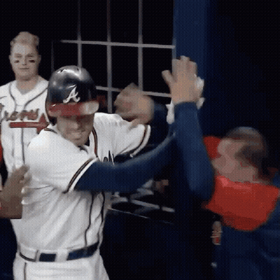 Baseball Player With A On Helmet High Five GIF
