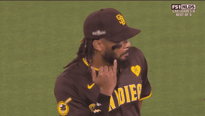 Baseball Player With Hat And Otis Jr. Shirt GIF